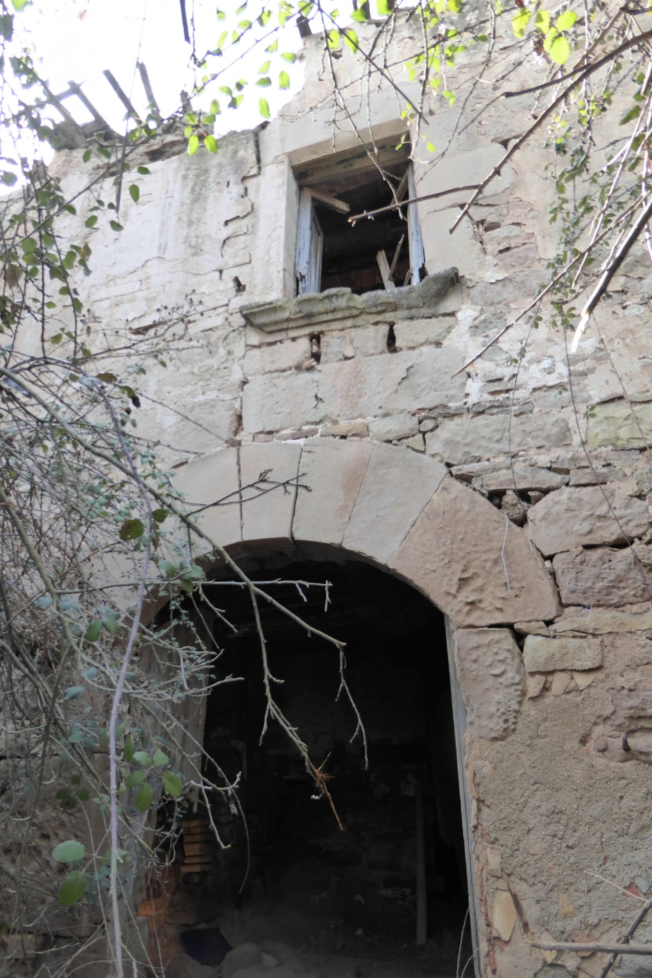 Portal i finestra de tradició renaixentista