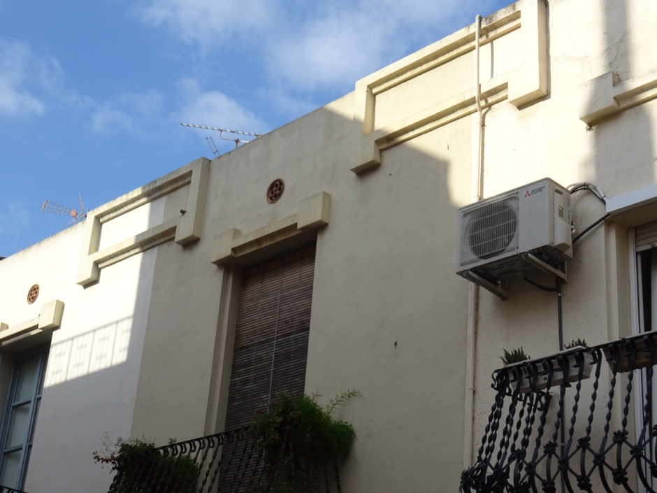 Coronament de les cases de Joan Estapé.