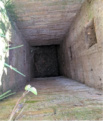Vista de l'interior del pou de registre de la mina. Font: Fes Fonts Fent Fonting.